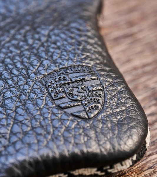 Étui - Porte-clés avec écusson Porsche en relief.