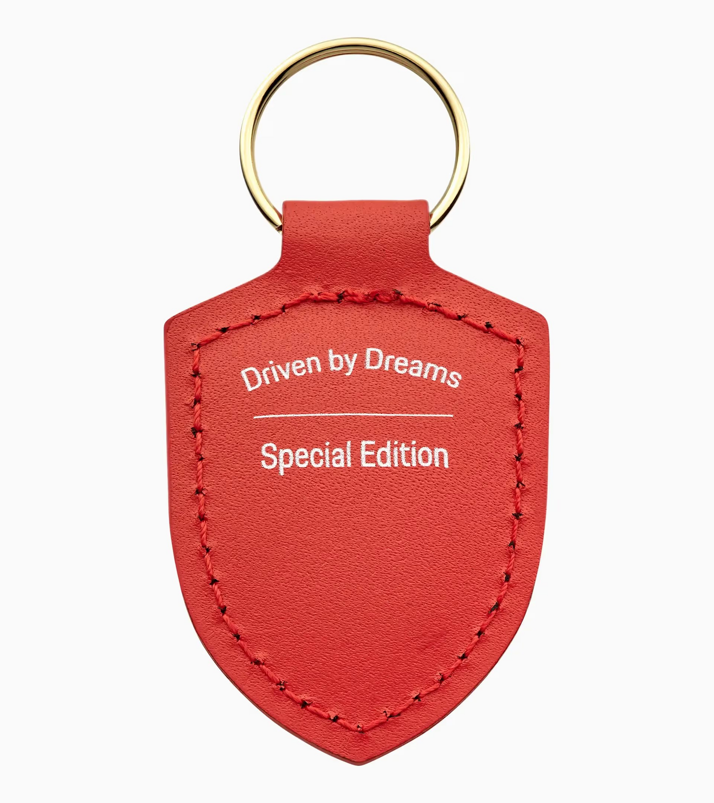 Porte-clés écusson « Driven by Dreams » – 75 ans