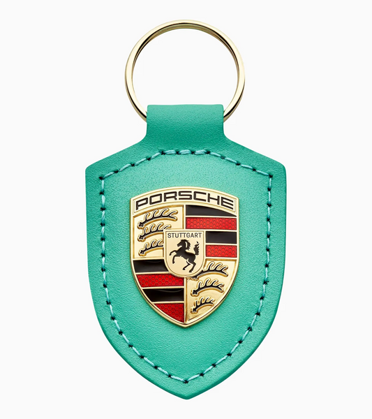 Porte-clés écusson « Driven by Dreams » – 75 ans