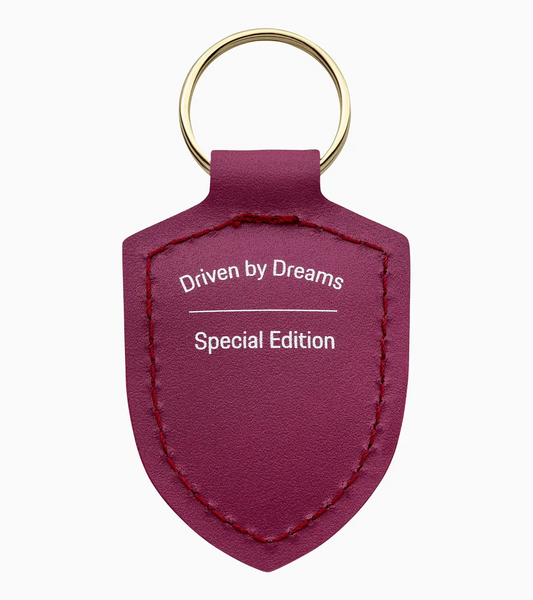 Porte-clés écusson « Driven by Dreams » – 75 ans